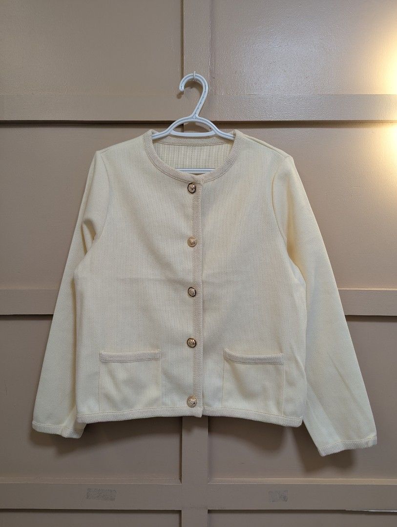 Cream Cardigan with Gold Buttons (Category: Coats, Jackets and Outerwear) located in Tarlac. Submitted by sunshine_shopph (Listing ID 1435779494, Image 1). Description: - Cream-colored cardigan - Long sleeves - Round neckline - Two front pockets - Decorative gold buttons with detailed design - Knitted trim - Lightweight material.