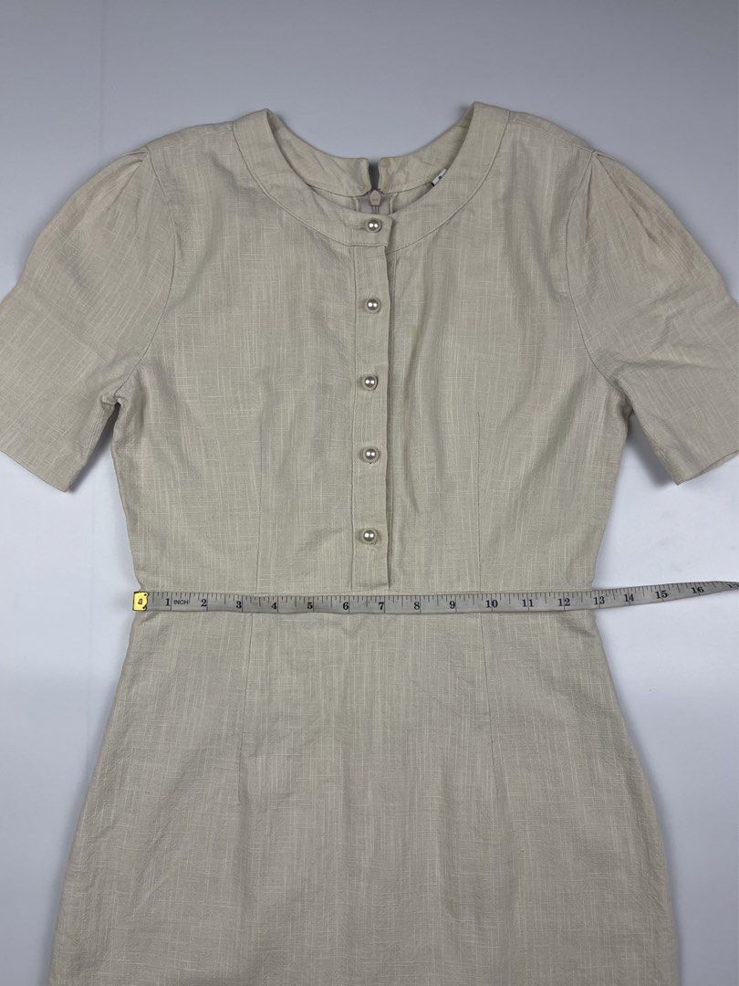 Cream Pearl-Button Linen Mini Dress (Category: Dresses) located in Cagayan de Oro. Submitted by kmcurations (Listing ID 1435848102, Image 3). Description: Cream Pearl-Button Linen Mini Dress • PHP 200 • Elegant short-sleeve mini dress in a textured cream linen fabric • Features a sophisticated round neckline and a row of classic pearl-like buttons on the front bodice • Designed with a flattering cinched waist and a secure back zipper closure • Fu
