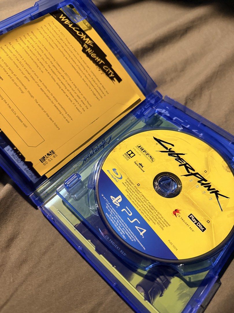 Cyberpunk 2077 - PS4 (Category: PlayStation) located in Manila. Submitted by acrunny (Listing ID 1435814524, Image 2). Description: - Cyberpunk 2077 for PS4 - Includes game disc and original case - Case has minor wear and tear - Published by CD Projekt Red - Set in Night City -Free PS5 Upgrade +SF for Delivery📍.