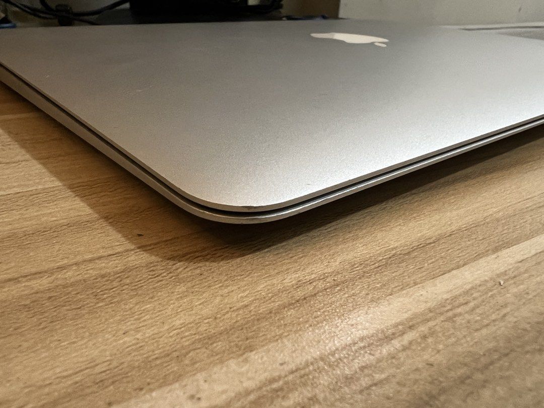 Defective: Apple Macbook Air (Category: Laptops & Notebooks) located in Pasig City. Submitted by jcrobl3 (Listing ID 1435763648, Image 2). Description: - Silver Macbook Air laptop - Full keyboard and trackpad - Apple logo visible - Sleek silver finish Selling this as is.. UNIT ONLY.. Does NOT turn on.. Selling for Parts only.. -NO Charger -Water damaged mever tuened on for 3 years na.. -bought in new zealand..