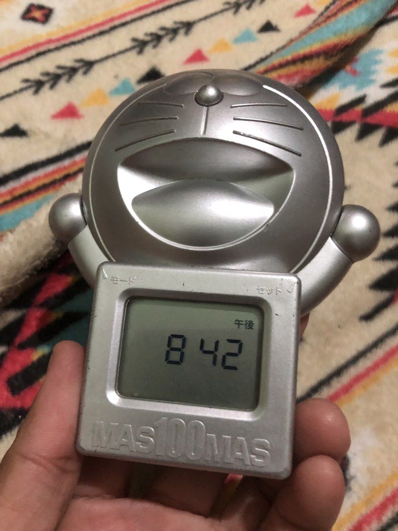 Doraemon silver desk timer and clock (Category: Clocks) located in Quezon City. Submitted by markgolveo (Listing ID 1435837136, Image 2). Description: Doraemon silver desk timer and clock Tested working Good display and sounds Press and hold to operate.