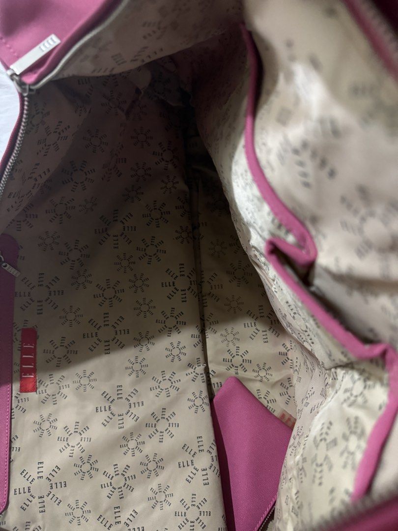 Elle travel tote bag (Category: Tote Bags) located in Manila. Submitted by bondea (Listing ID 1435904589, Image 3). Description: Negotiable Pretty in pink tote travel bag Material: Canvas Washable Brand new Authentic .