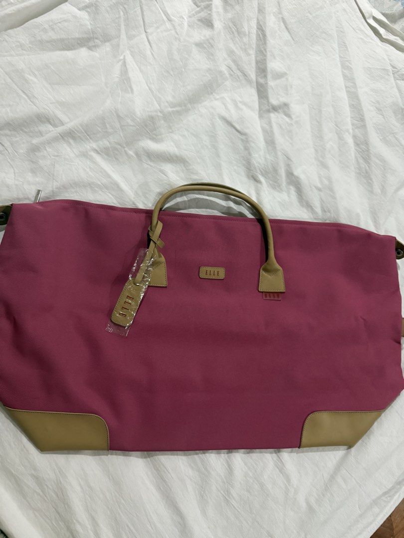 Elle travel tote bag (Category: Tote Bags) located in Manila. Submitted by bondea (Listing ID 1435904589, Image 1). Description: Negotiable Pretty in pink tote travel bag Material: Canvas Washable Brand new Authentic .