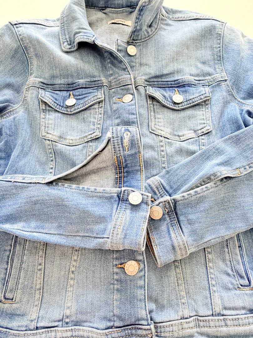 Esprit Denim Jacket (Category: Coats, Jackets and Outerwear) located in Makati City. Submitted by eyes_jade (Listing ID 1435910181, Image 3). Description: - Esprit light blue denim jacket - Classic collar - Button-down closure - Two chest pockets - Long sleeves with buttoned cuffs - Straight hem - Light wash - Standard fit.