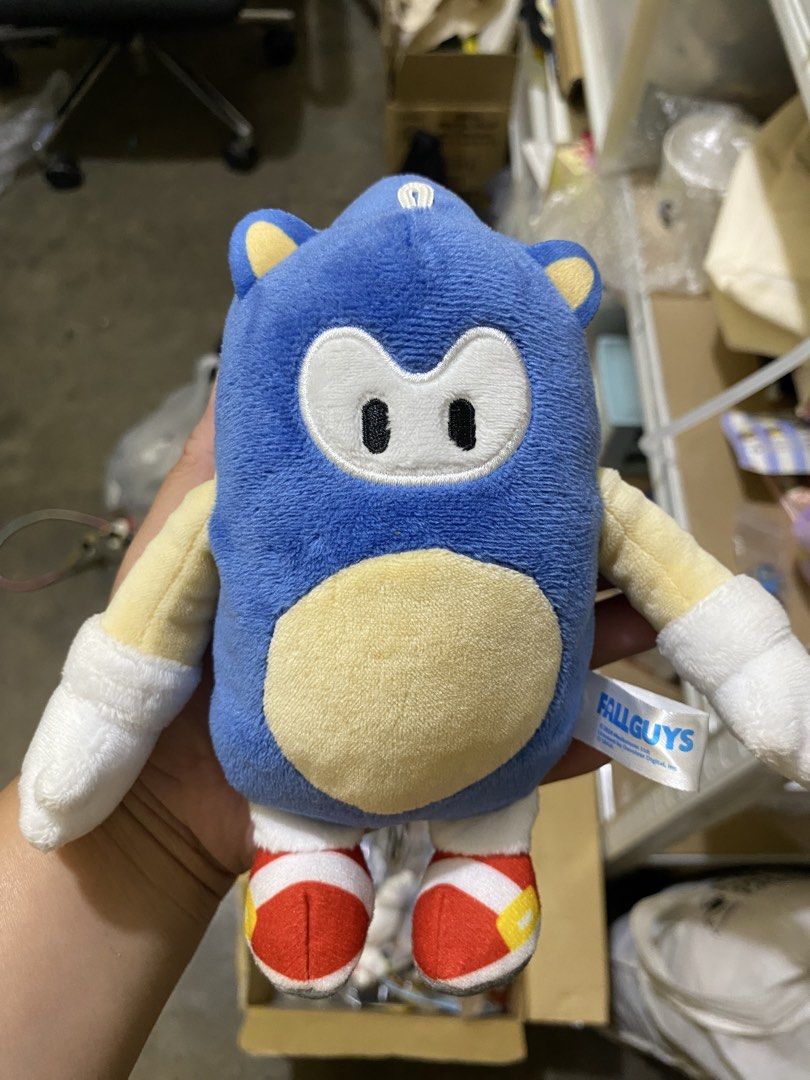 Fall Guys Sonic Plush Toy (Category: Plushies & Soft Toys) located in Imus. Submitted by mnmv23 (Listing ID 1435829004, Image 1). Description: - Fall Guys x Sonic mashup plush toy! - Features Sonic's spikes and red shoes. - Soft and huggable design. - Ideal for fans of Fall Guys and Sonic. - Great as a collectible or gift..