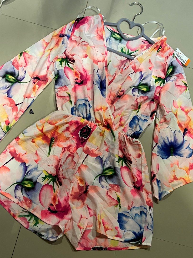 Floral romper (Category: Rompers) located in Manila. Submitted by gee0505 (Listing ID 1435905395, Image 1). Description: Branded from us Size med Fit small to Semi L only.