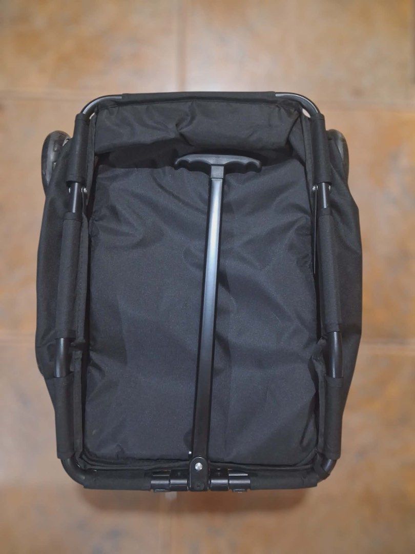 Foldable pet stroller (Category: Homes & Other Pet Accessories) located in Pasig City. Submitted by stelala19 (Listing ID 1435871279, Image 3). Description: Selling a foldable pet stroller or wagon trolley, often used for transporting pets or shopping items. • Foldable Design: Features a collapsible frame for compact storage and portability. • Structure: Madeo of durable cloth and a sturdy metal frame. • Usage: Ideal for taking pets to the park, 