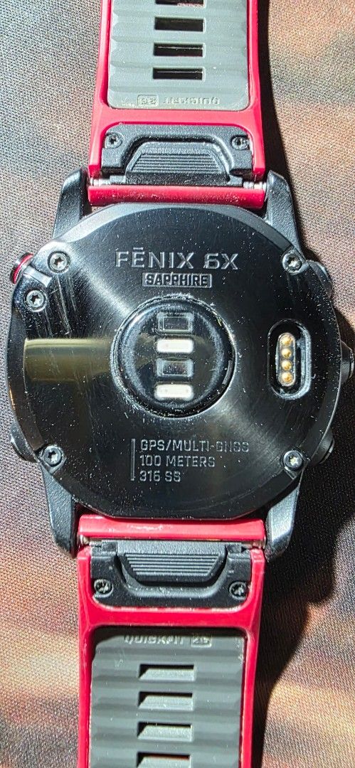 Garmin Fenix 6X Sapphire Smartwatch (Category: Wearables & Smart Watches) located in Marikina City. Submitted by kgcdl (Listing ID 1435884956, Image 2). Description: - Garmin Fenix 6X Sapphire smartwatch - Stylish red strap - Black bezel and digital display - Includes original box - GPS and Multi-Sport functionality - 100 meters water resistance.