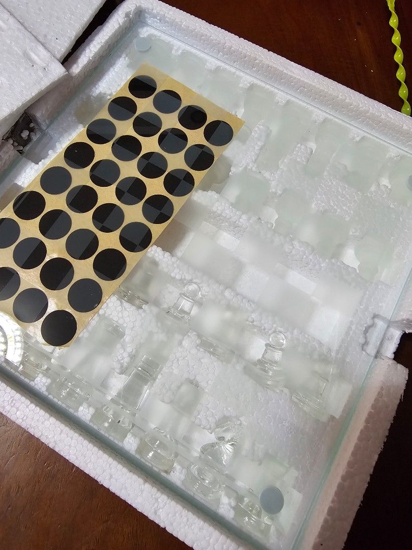 Glass Chess Set (Category: Board Games & Puzzles) located in Norzagaray. Submitted by somethingpretty_ (Listing ID 1435871749, Image 2). Description: - Elegant glass chess set - Glass chessboard with frosted squares and clear borders - Complete set of glass chess pieces - Protective foam insert for pieces - Includes black and white stickers - Ready to play! - item is brandnew - unused - 10 inches - rfs: will purchase the usual black and white che