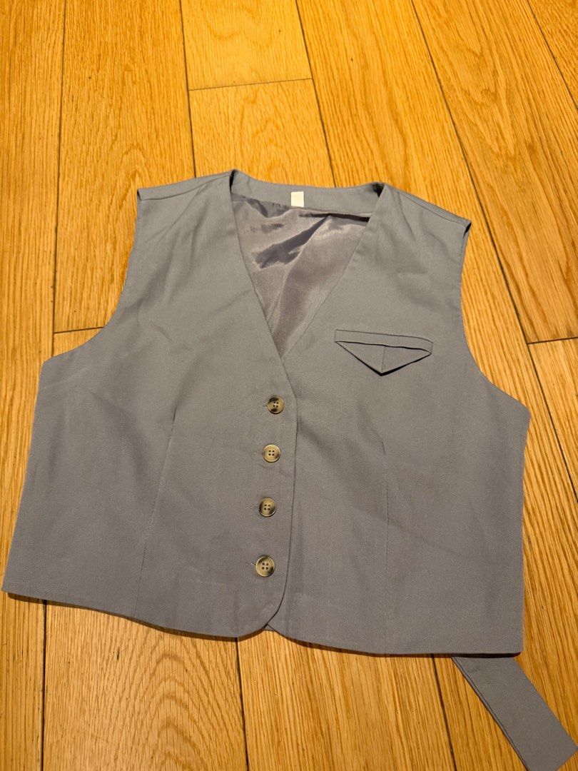 Gray Vest (Like Zara) (Category: Blouses) located in Makati City. Submitted by shopbb (Listing ID 1435843592, Image 1). Description: With adjuster at the back.