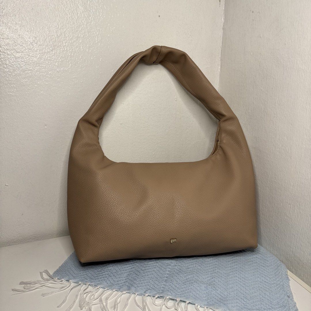 GVN Hobo Bag (Category: Luxury Bags & Wallets) located in Quezon City. Submitted by aarchives (Listing ID 1435772567, Image 3). Description: RFS: - too much bags - decluttering PRICE: Medium Hobo - ₱1,300 (taupe) Small Hobo - ₱ 1,000 (chili/taupe) NOTE: - Take all for a discounted price - Negotiable - Used 1-3 times only. MOP: - GCASH / MARI DELIVERY - Same day (book your own) .