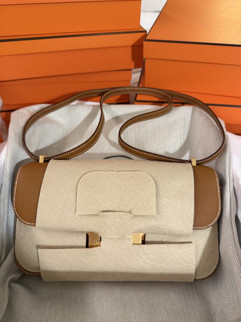 Hermes Constance Elan Gold GHW stamp K (Category: Luxury Bags & Wallets) located in Quezon City. Submitted by lightningrush (Listing ID 1435743651, Image 2). Description: Hermes Evelyne PM Gold PHW stamp K 🍊 Brand new. With receipt from boutique. 🍊 Comes complete with booklet, dustbag, box, paperbag, receipt. 📍 Meet up / pick up: Greenhills / Tomas Morato / Maginhawa Tags: Epsom 37 gog.