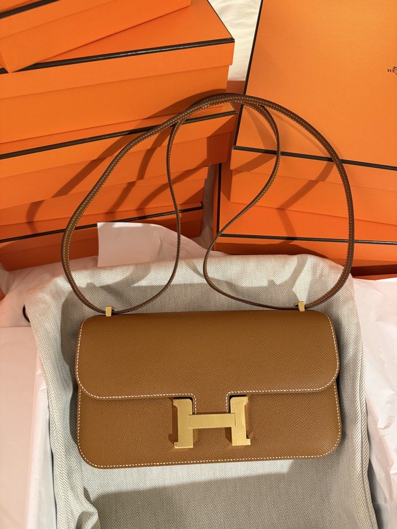 Hermes Constance Elan Gold GHW stamp K (Category: Luxury Bags & Wallets) located in Quezon City. Submitted by lightningrush (Listing ID 1435743651, Image 1). Description: Hermes Evelyne PM Gold PHW stamp K 🍊 Brand new. With receipt from boutique. 🍊 Comes complete with booklet, dustbag, box, paperbag, receipt. 📍 Meet up / pick up: Greenhills / Tomas Morato / Maginhawa Tags: Epsom 37 gog.