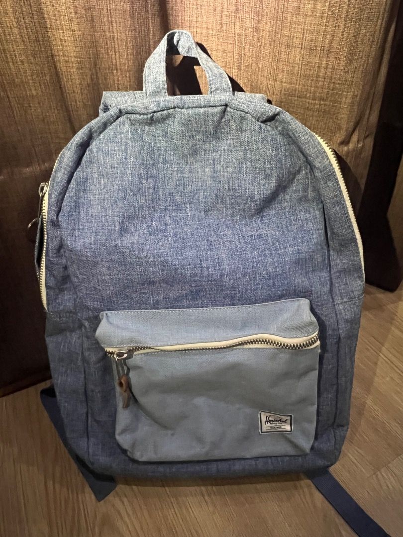 Herschel settlement Mid-Volume Backpack (Denim Light Blue) (Category: Backpacks) located in Caloocan City. Submitted by julianne_so.3282 (Listing ID 1435743439, Image 1). Description: Capacity: Typically available in a standard 23-liter volume. A mid-volume version is also produced. Construction: Often crafted from 600D polyester. Storage:Includes a padded floating sleeve that can accommodate 15-inch or 16-inch laptops. Features a single large ma