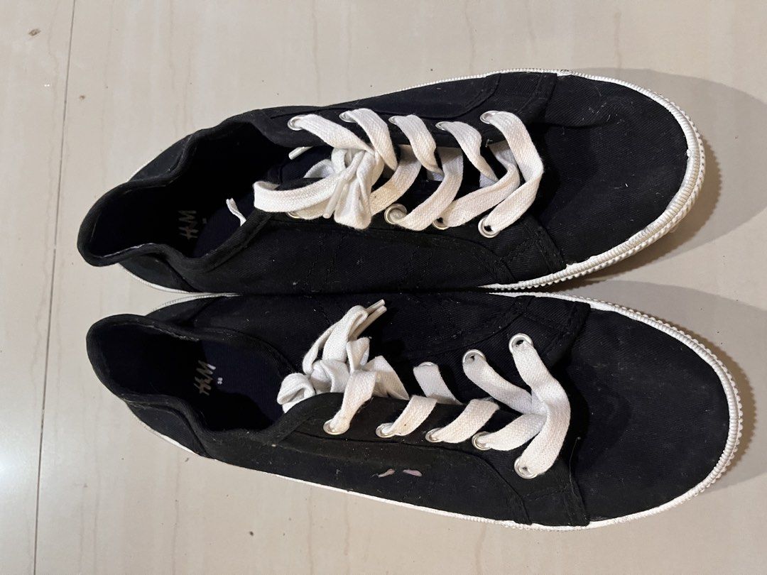 H&M Black Canvas Shoes - Size 38 (Category: Heels) located in Rizal. Submitted by authenticity17 (Listing ID 1435827131, Image 3). Description: - H&M black canvas shoes - Size 38 - White laces and sole - Classic, casual design - Suitable for everyday wear - Soles show some wear.