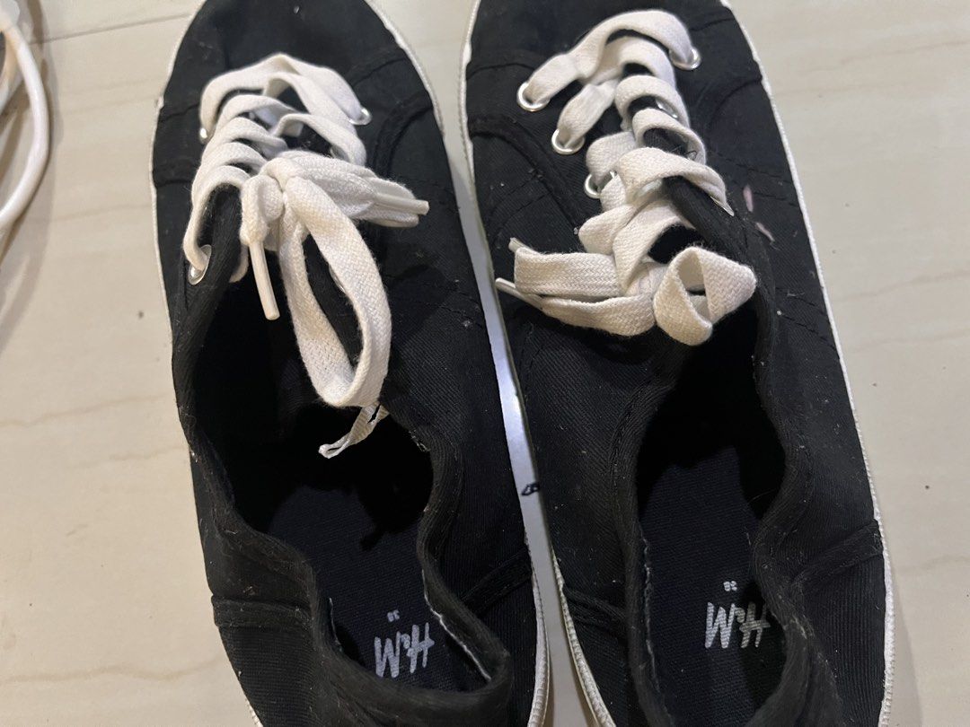 H&M Black Canvas Shoes - Size 38 (Category: Heels) located in Rizal. Submitted by authenticity17 (Listing ID 1435827131, Image 1). Description: - H&M black canvas shoes - Size 38 - White laces and sole - Classic, casual design - Suitable for everyday wear - Soles show some wear.