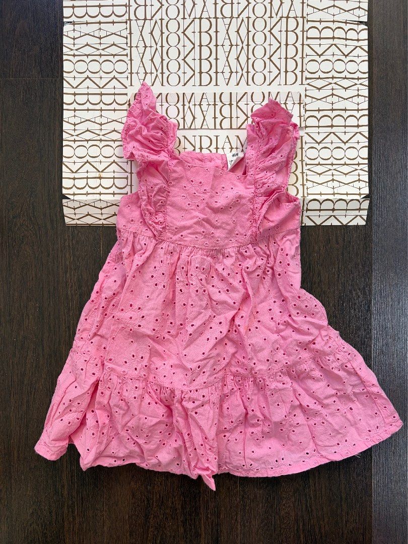 H&M pink eyelet dress (Category: Babies & Kids Fashion) located in Manila. Submitted by coolandchic (Listing ID 1435854963, Image 1). Description: 12-18.