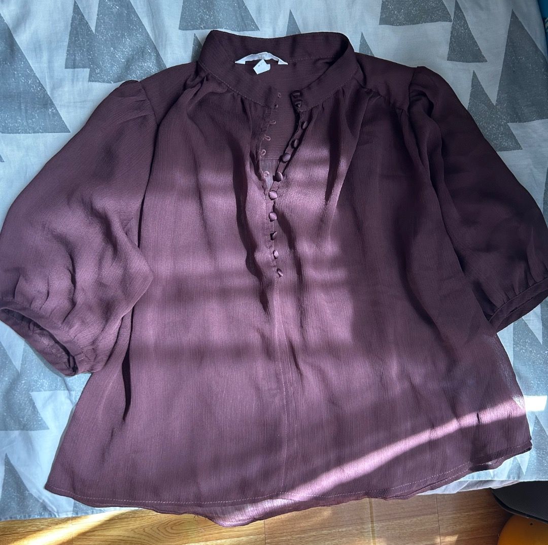 H&M Romantic Top with Puff Sleeves (Category: Blouses) located in Paranaque City. Submitted by maffyp (Listing ID 1435769471, Image 1). Description: Used only once. Nice for jeans or white slacks. RFS: Too many tops already.