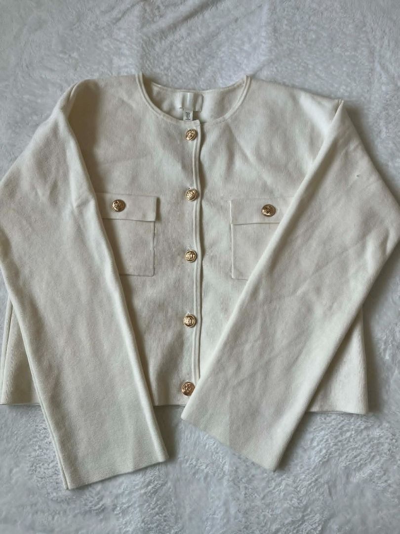 H&M White Knit Cardigan (Category: Coats, Jackets and Outerwear) located in Pasig City. Submitted by closet_reframe (Listing ID 1435885706, Image 1). Description: Brand New with tags, very pretty and elegant. Demin skirt and heels are also for sale! S:M.