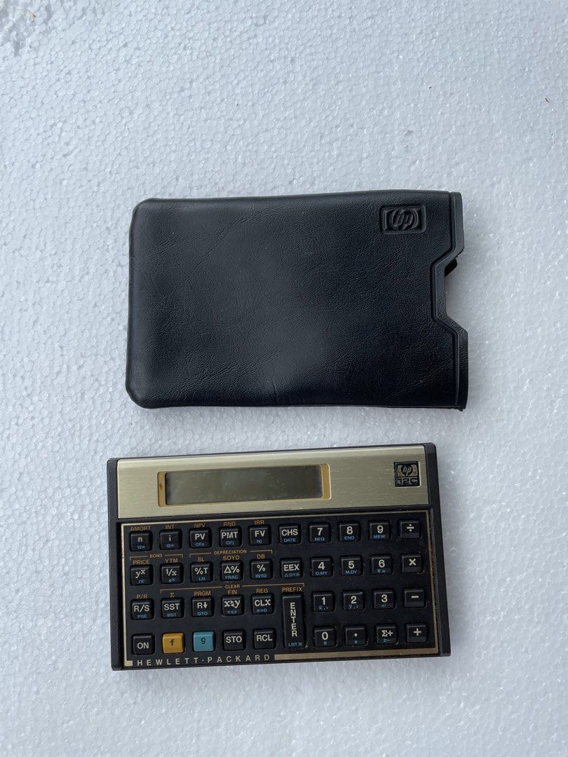 HP 12C Financial Calculator with Case and Manual