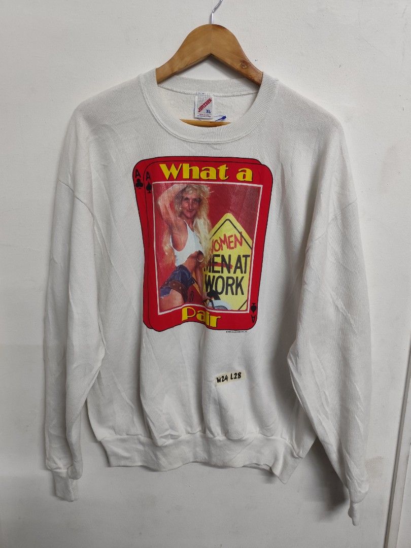 Jerzees Women at Work Sweatshirt XL (Category: Tshirts & Polo Shirts ) located in Compostela. Submitted by fashiondeamar (Listing ID 1435845837, Image 1). Description: - Vintage Jerzees sweatshirt - Features a "Women at Work" graphic - Made in the USA - Size: XL - Design: Playing card graphic with a woman in work attire - Style: Crew neck, long sleeves - Material: 50% cotton, 50% polyester.
