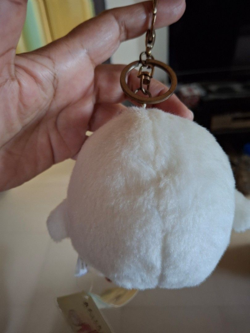 Kanahei's White Bird Keychain (Category: Plushies & Soft Toys) located in Quezon City. Submitted by pure_trinsky (Listing ID 1435714214, Image 2). Description: - Kanahei's Small Animals white bird plush keychain - Features a round, fluffy white bird design - Adorable yellow beak and small eyes - Comes with a gold-colored keychain clip - Includes the original tag with character illustrations - Great for adding cuteness to your bag or keys.