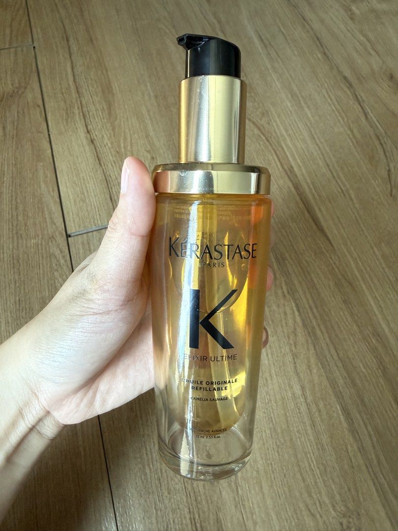 Kerastase Elixir Ultime Hair Oil (Category: Hair) located in Manila. Submitted by prelovedbymaeish (Listing ID 1435759362, Image 2). Description: Selling my Kerastase Elxir Ultimate Oil (75ml). Used around 1/4 of the bottle lang. Bought it around ₱4,756 - Kerastase Elixir Ultime hair oil - Luxurious hair oil - Clear glass bottle with gold pump - Infused with nourishing oils - Leaves hair smooth and radiant - Perfect for all hair types - Refillabl