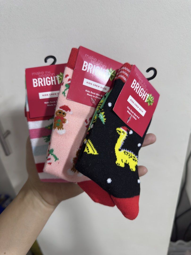 Kids Crew Socks - Christmas Design (Category: Babies & Kids Fashion) located in Rizal. Submitted by GirlDeclutter (Listing ID 1435822416, Image 1). Description: - Kids' Christmas crew socks (set of 3) - Designs: Stripes, Gingerbread Man, Dinosaur - Size: 6-8 - Material: 98% Polyester, 2% Spandex - Perfect for the holiday season!.