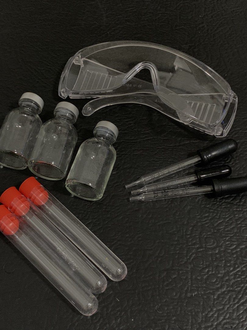 Laboratory Equipment Set - Goggles, Vials, Droppers, Test Tubes (Category: Medical Supplies & Tools) located in Bacoor. Submitted by viennxy (Listing ID 1435789568, Image 1). Description: - Includes clear safety goggles - Features three small glass vials with gray caps - Comes with three droppers - Contains three test tubes with red caps - Ideal for science experiments and educational use - All items are clean and ready for use - Perfect for labs