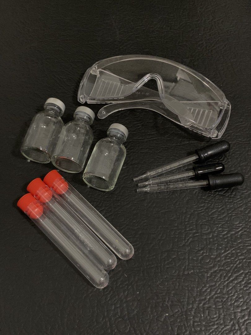 Laboratory Equipment Set - Goggles, Vials, Droppers, Test Tubes (Category: Medical Supplies & Tools) located in Bacoor. Submitted by viennxy (Listing ID 1435789568, Image 2). Description: - Includes clear safety goggles - Features three small glass vials with gray caps - Comes with three droppers - Contains three test tubes with red caps - Ideal for science experiments and educational use - All items are clean and ready for use - Perfect for labs