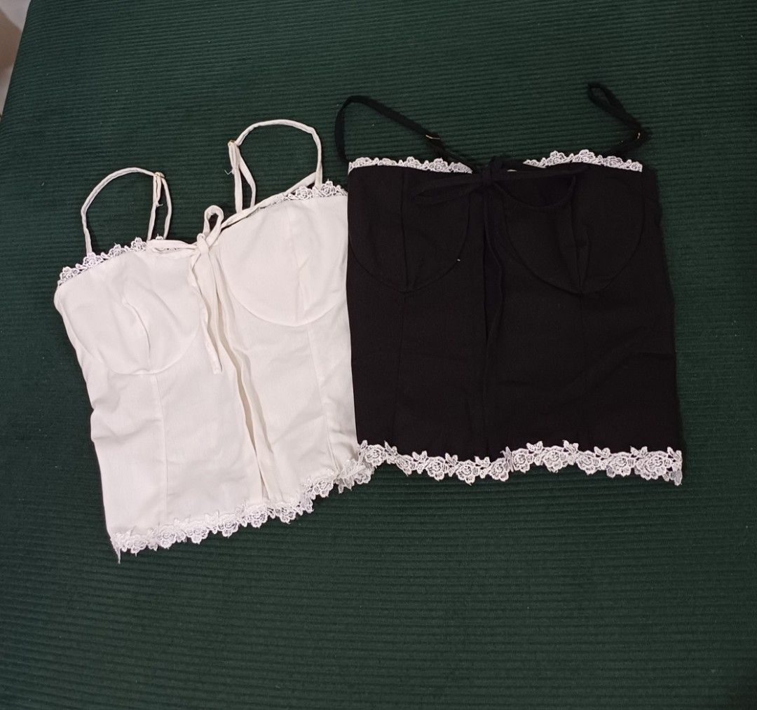 Lace Trim Corset Top Linen (Category: Others Tops) located in Angeles City. Submitted by dianern (Listing ID 1435720994, Image 1). Description: - Two corset tops available - White corset top: front zipper, adjustable straps, lace trim - Black corset top: tie-up front, adjustable straps, lace trim - Both tops feature delicate lace trim - Perfect for layering or wearing alone.