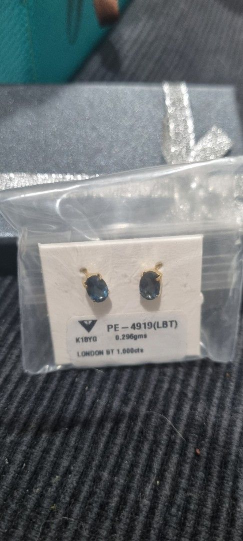 London Blue Topaz Earrings (Category: Earrings) located in Manila. Submitted by luiday919 (Listing ID 1435844940, Image 1). Description: - ETOYO Earrings - Featuring London Blue Topaz gemstones - Gold-colored metal setting - Comes with a gift box - Model: PE-4919(LST) - Weight: 0.200gms.