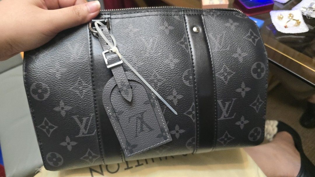 LV Reverse Monogram Eclipse Keepall Bandouliere 25 (Category: Luxury Bags & Wallets) located in Taguig. Submitted by Cruise2019 (Listing ID 1435765931, Image 2). Description: LVReverse Monogram Eclipse Keepall Bandouliere 25. Box,Dustbag.