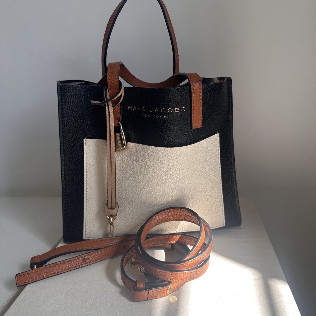 Marc Jacobs Mini Grind Tote in Smoke Almond (Category: Luxury Bags & Wallets) located in San Pablo. Submitted by louiseeeej (Listing ID 1435716625, Image 1). Description: Authentic With tags inside In Smoke Almond color 9/10 condition LP posted, selling low already 😊.