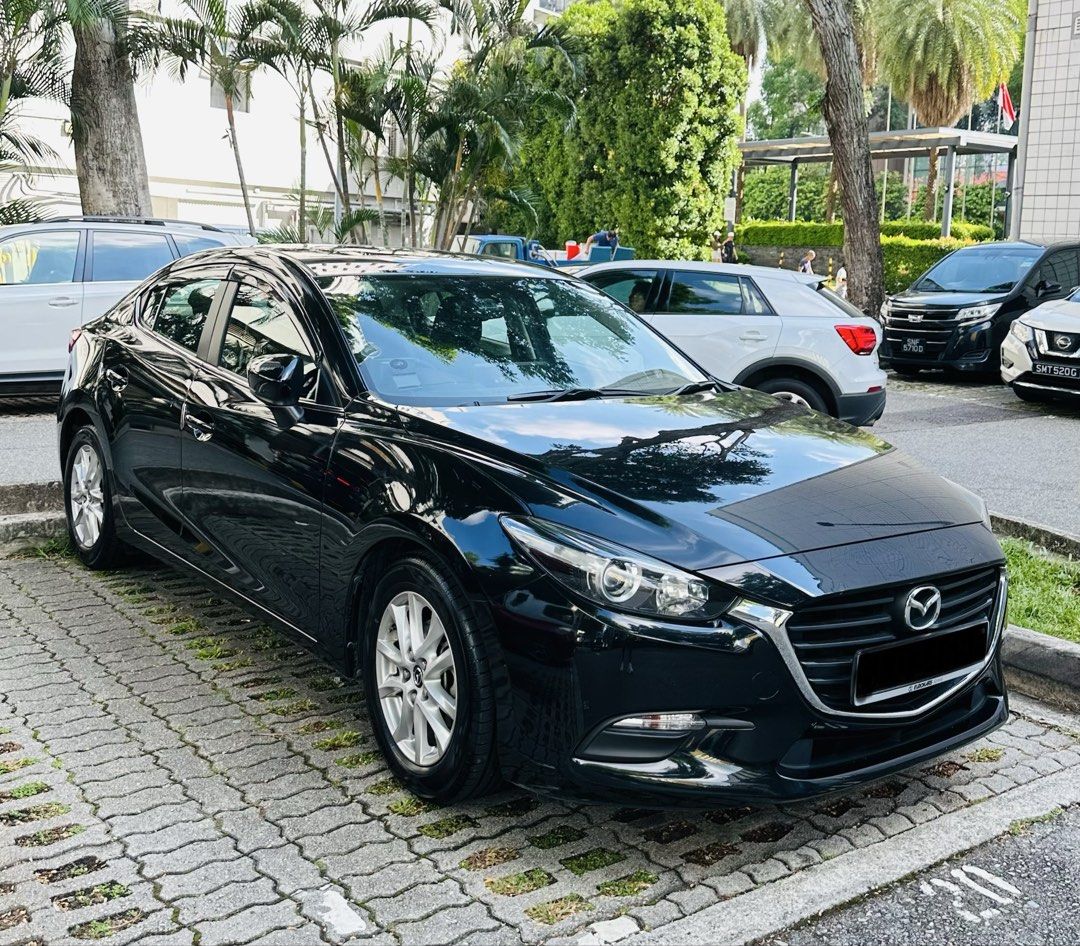 Mazda 3 Sedan 1.5 Deluxe (A) (Category: Used Cars) located in Singapore. Submitted by manasmohsin (Listing ID 1435557729, Image 3). Description: Mazda 3 Sedan (Top Model) | Pristine Condition | Sunroof | Low Mileage * meticulously maintained, accident-free, and handled with care * Low mileage – only 74,000 km driven (just ~4k/year over the last 2 years) * Top variant sedan – comes with sunroof and all premium features * Upgraded infotainment – hi