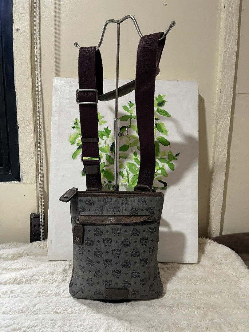 Mcm Sling bag for men Original with flaws (Category: Sling Bags) located in Naawan. Submitted by twillycalledprelovedbags (Listing ID 1435779603, Image 1). Description: issue: lining sa lips, sign of use, ykk zipper and etikita.