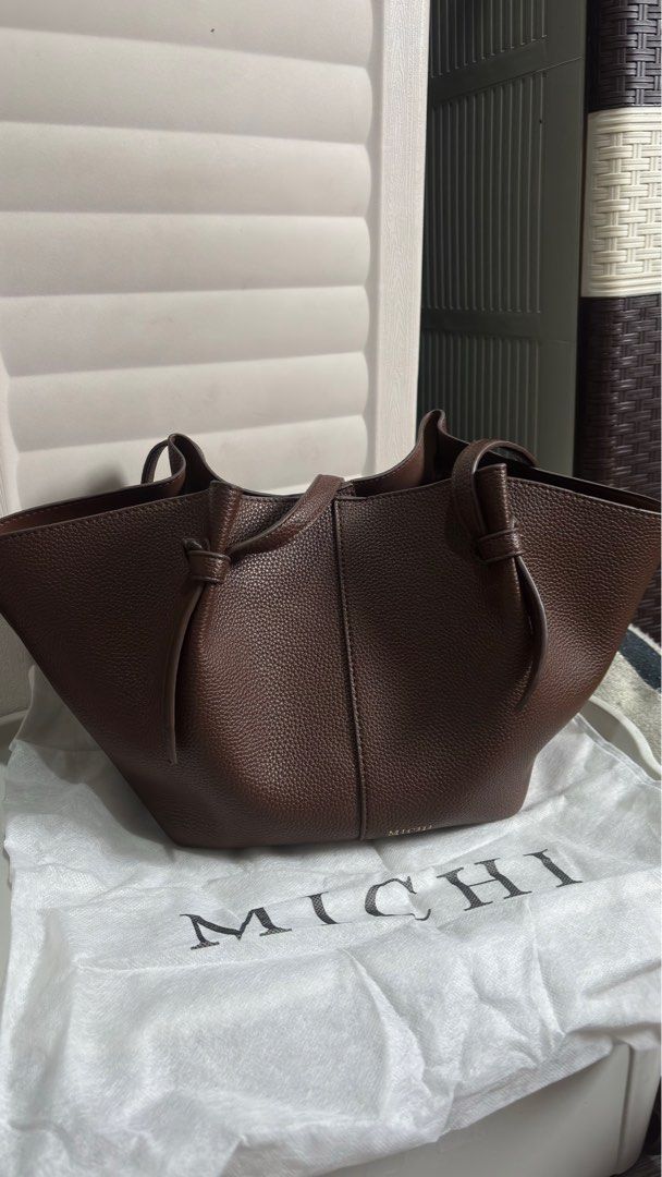 Michi Small Everyday Pebble Tote Bag w/ pouch (Category: Shoulder Bags) located in Manila. Submitted by declutterwithroycie (Listing ID 1435784344, Image 1). Description: used with care condition 8/10 with pouch and dustbag.