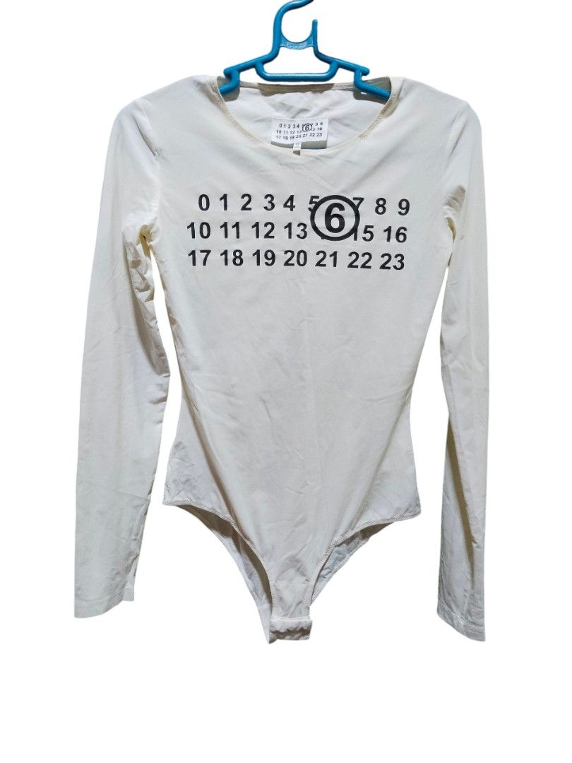 MM6 Maison Margiela White Bodysuit (Category: Longsleeves) located in Mandaue City. Submitted by chaseandchast (Listing ID 1435818946, Image 2). Description: MM6 Maison Margiela White Bodysuit Small Excellent condition Color rate - 9.5/10 Issue - stain at the back (see last pic) plus shipping fee.