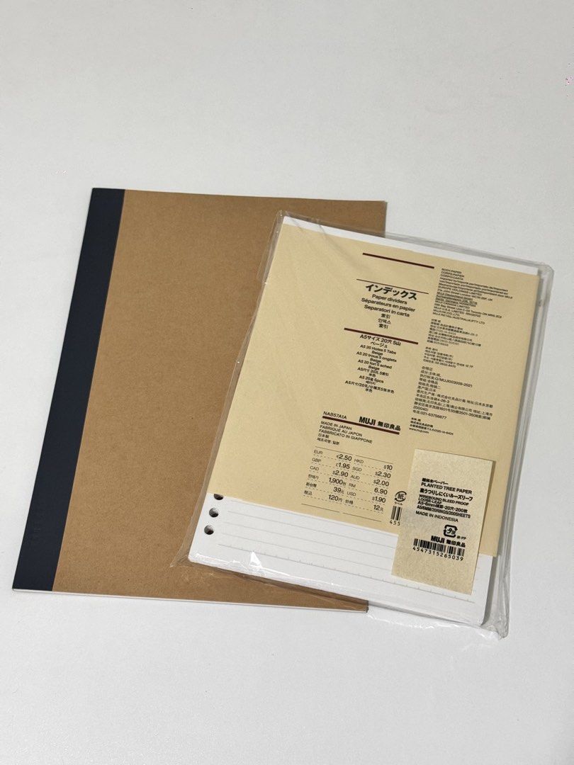 MUJI Notebook and Loose Leaf Paper Divider Bundle (Category: Stationery & School Supplies) located in Makati City. Submitted by quazzell (Listing ID 1435770630, Image 1). Description: - MUJI notebook with brown cover and black spine. - Includes MUJI Wirebound bleed proof loose leaf (A5/6mm/20 rings/200 sheets index paper).