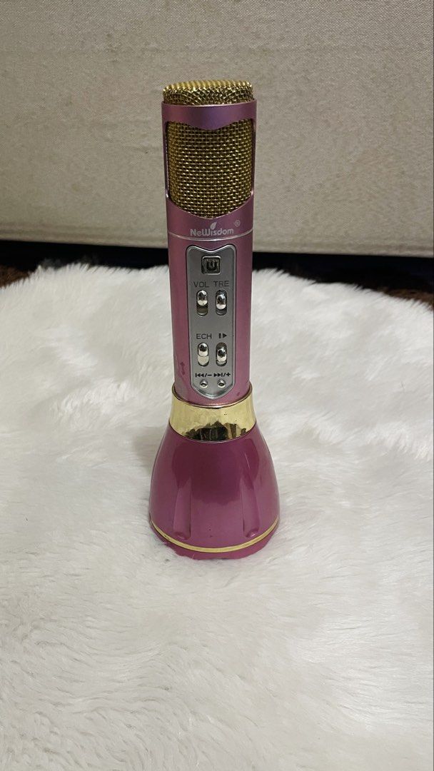 Newisdom Wireless Bluetooth Karaoke Microphone (Category: Microphones) located in Quezon City. Submitted by sissymissy1527 (Listing ID 1435887214, Image 3). Description: Tested working With android usb cord See the flaws in the last photo Selling as is where is -This is a NeWisdom Princess Style wireless karaoke microphone in pink.It features built-in Bluetooth connectivity for singing and playing music.The device includes echo effects and volume