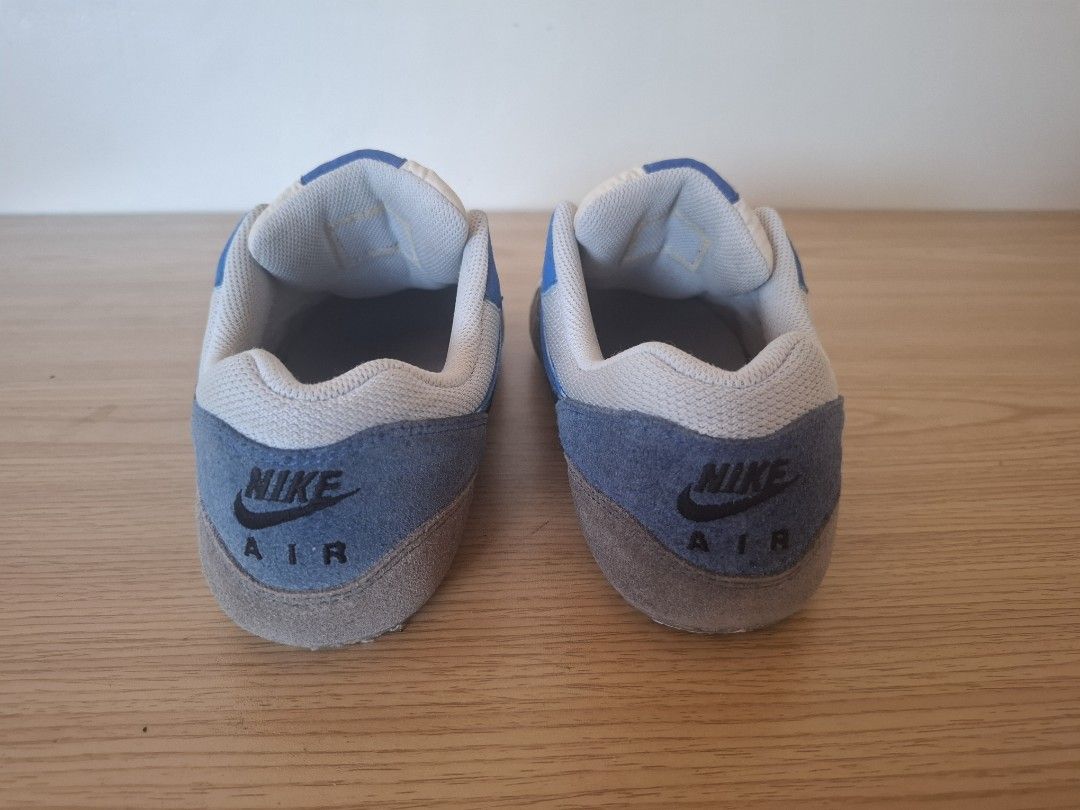 Nike Air Max 1 Sneakers Open for Swapping (Category: Sneakers) located in Quezon City. Submitted by sgtshae (Listing ID 1435810615, Image 1). Description: - Nike Air Max 1 sneakers - Color: Blue, white, and grey - Iconic Nike swoosh - Signs of wear on soles - Blue and white tongue - Grey toe cap - Nike Air logo on heel.