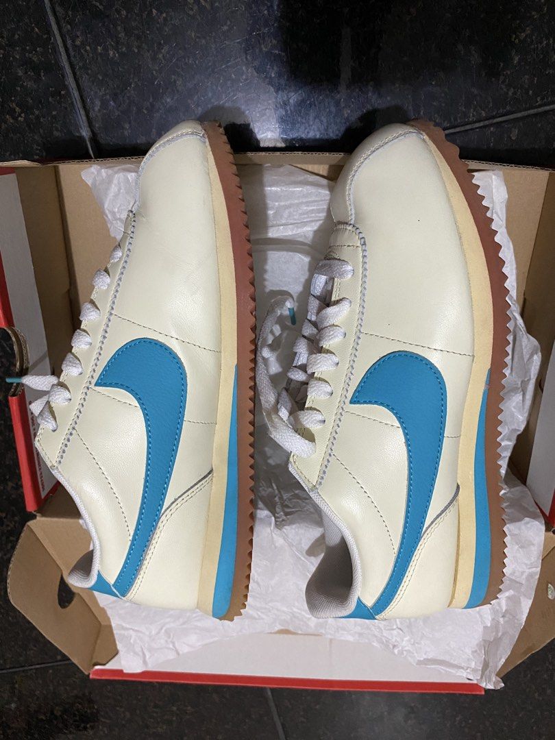 Nike Cortez Cream Blue (Category: Sneakers) located in Calapan. Submitted by yowstuff (Listing ID 1435841515, Image 3). Description: - Classic Nike Cortez - Cream and blue colorway - Features Nike swoosh and logo - Brown sole - Comes with original box.