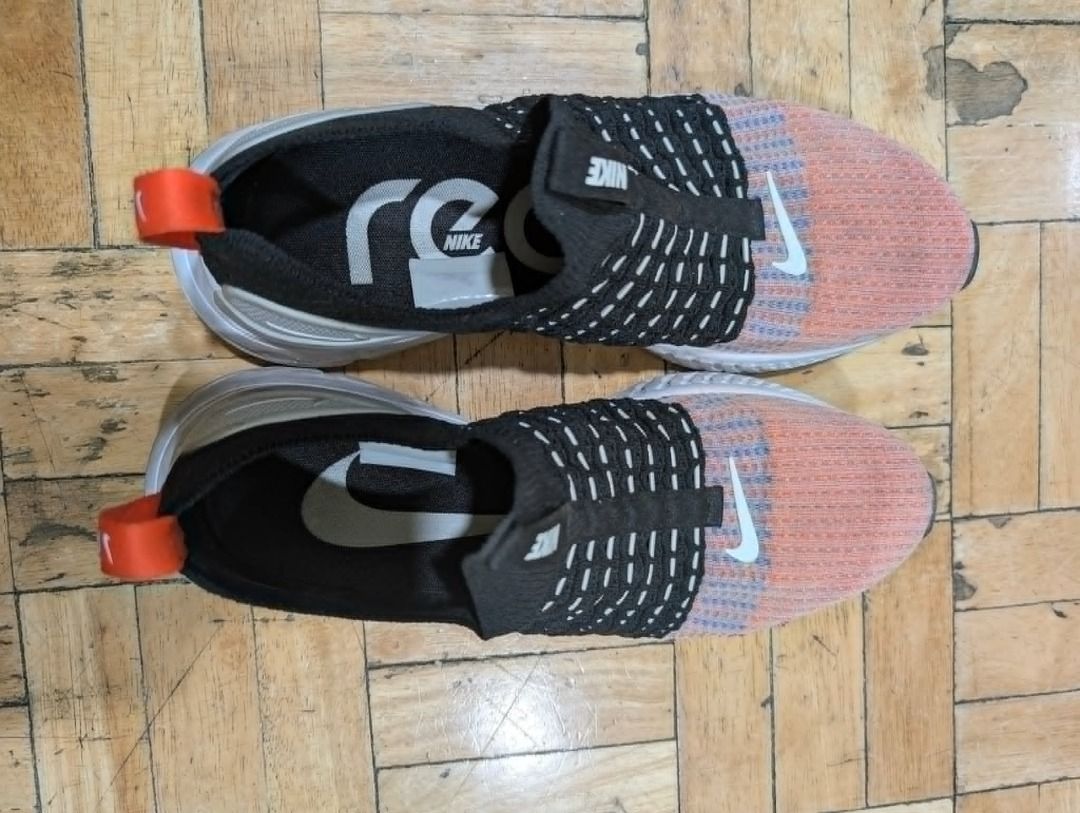 Nike React Phantom Run Flyknit 2 - Black/Orange/Grey (Category: Sneakers) located in Quezon City. Submitted by trainforless (Listing ID 1435856123, Image 1). Description: Size: US: 9.5 UK: 8.5 EUR: 43 CM: 27.5 Experience the ultimate "laceless" comfort. These Nike React Phantom Run Flyknit 2s are designed for runners and casual wearers who want a snug, sock-like fit without the hassle of laces. The React foam is still incredibly bouncy and provid