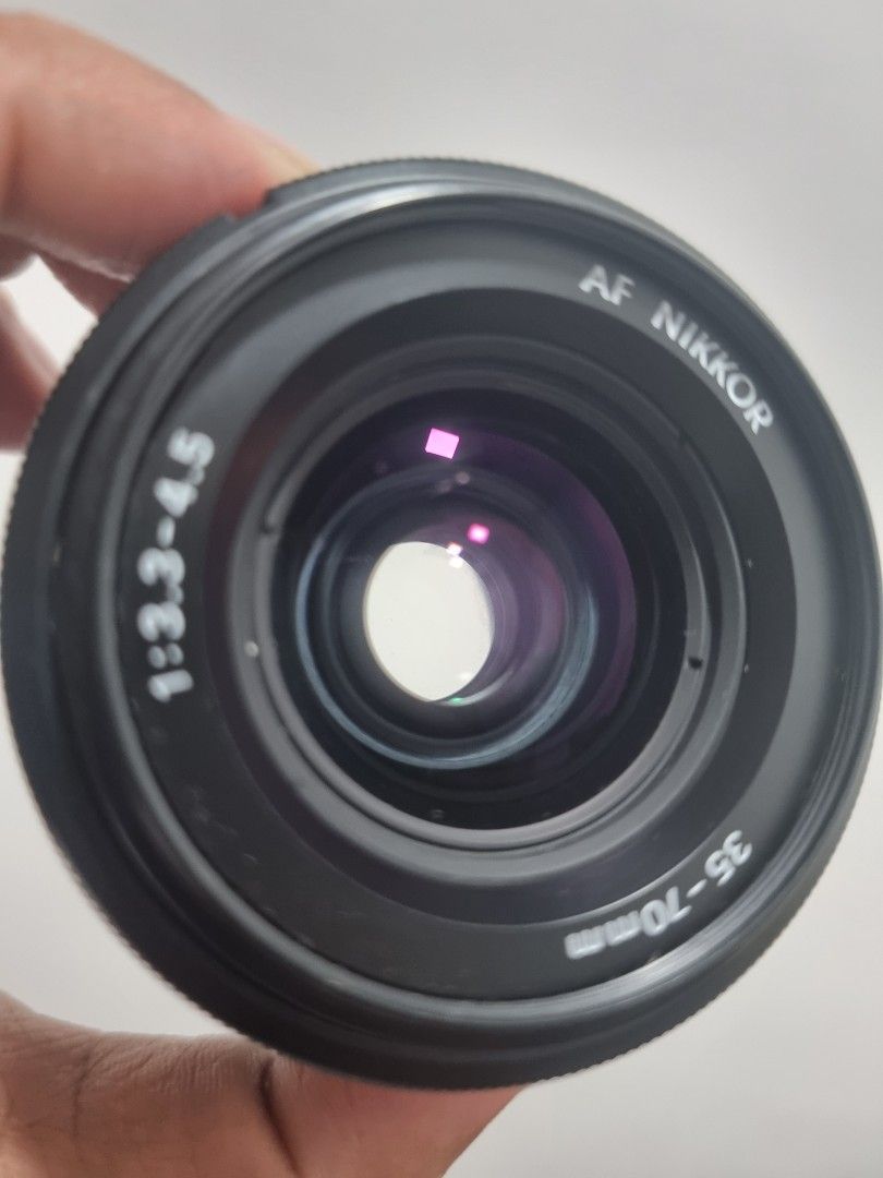 Nikon AF Nikkor 35-70mm Lens (Category: Cameras) located in San Fernando. Submitted by filmburrrn_ (Listing ID 1435886667, Image 1). Description: gamit ko sa fm2 Nikon AF Nikkor 35-70mm Lens -may sign ng fungus pero usable price is 2500.