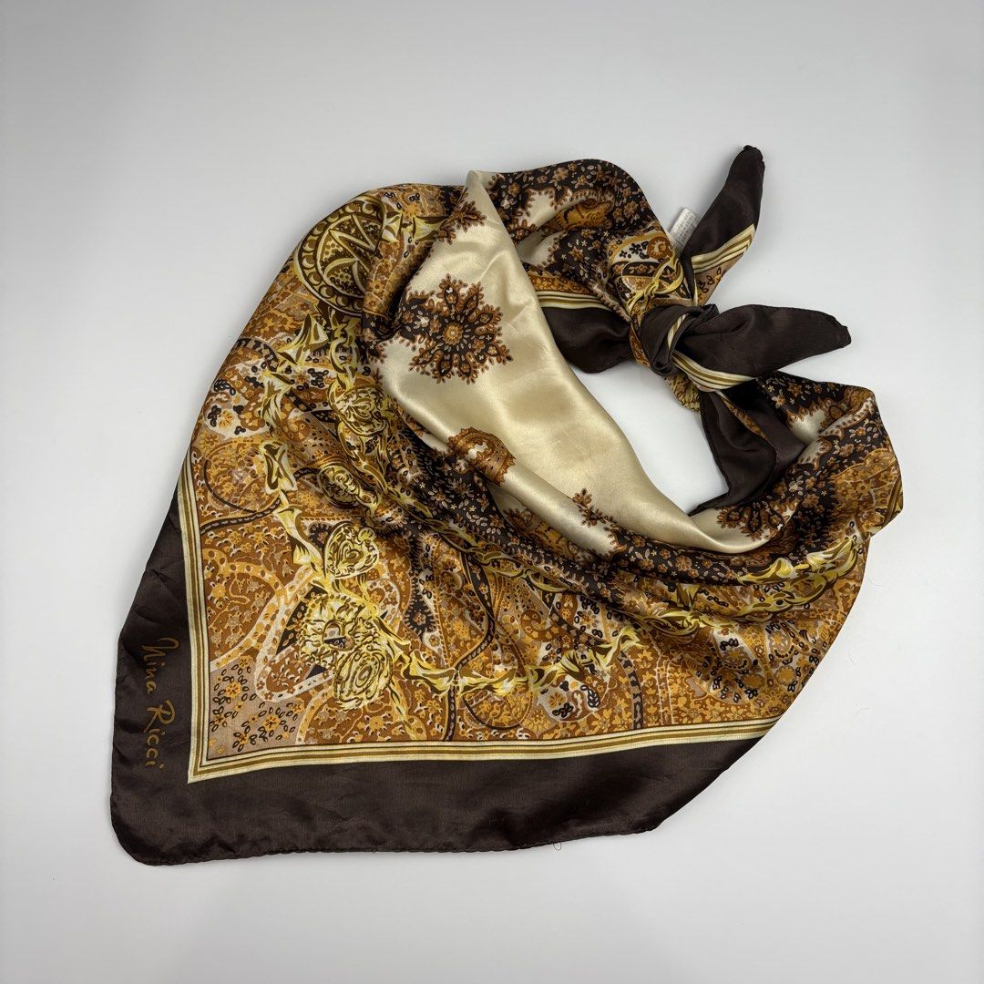 Nina Ricci Silk Scarf (Category: Luxury Accessories) located in Bacolod City. Submitted by cast.archives (Listing ID 1435850365, Image 1). Description: Nina Ricci Silk Scarf Authentic Condition: Excellent Flaw: None Measurements Width: 34" Length: 34".