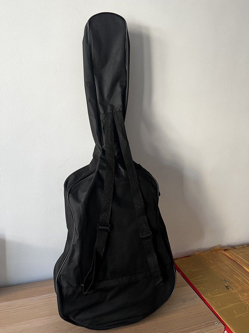 Original Fender Guitar Gig Bag (Category: Musical Instruments) located in Makati City. Submitted by whiskey9 (Listing ID 1435808048, Image 2). Description: - Fits standard size acoustic/classical guitar up to 41 in - No padding - Condition: 9/10 - Meet-up in Makati - Cash/Gcash.
