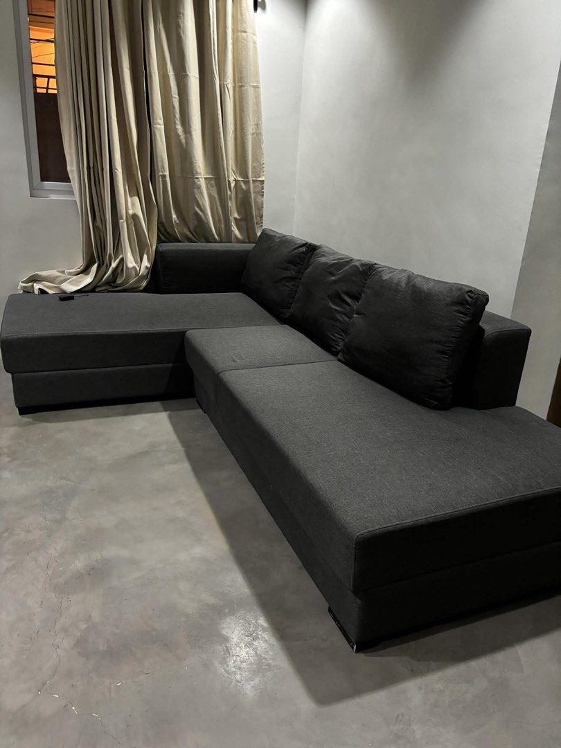 Our Home Chysle Sectional Sofa (Category: Sofas) located in Valenzuela. Submitted by decluttrr (Listing ID 1435817316, Image 1). Description: 🔥 FOR SALE: OUR HOME Modern Contemporary Sectional Sofa 🔥 Dark Grey Upgrade your living space with this used but still in good condition L-shaped sectional sofa from OUR HOME—stylish, durable, and super comfortable! 💰 Selling Price: ₱15,000 (negotiable) 🏷️ SRP: ₱27,950 (Great deal!) Free waterproof cove