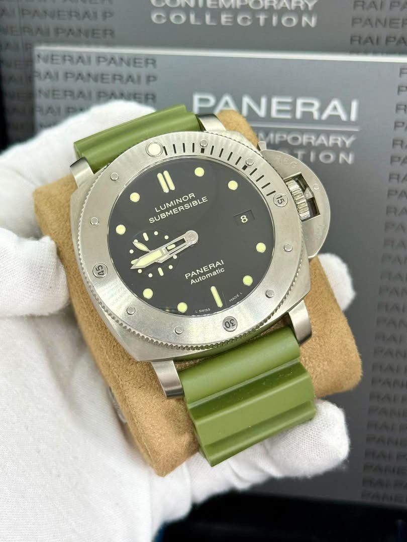 Panerai Luminor Submersible Automatic Watch (Category: Men's Watches) located in Cabanatuan. Submitted by albertgonzales27 (Listing ID 1435771017, Image 2). Description: - Panerai Luminor Submersible Automatic Watch - Black dial with luminous markers and hands - Stainless steel case - Green rubber strap - Automatic movement - Includes additional straps and accessories.