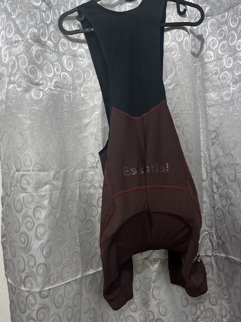 Pas Normal Studios Essential Bib Shorts (Category: Activewear) located in Makati City. Submitted by gabrayco (Listing ID 1435897855, Image 2). Description: - Pas Normal Studios Essential bib shorts - Maroon color - Size S - Features Pas Normal Studios logo - Made in Italy - Minor hole on leg - Main Fabric: 86% Polyamide, 14% Elastane - Top Fabric: 67% Polyester, 33% Elastane - Original Price: 15000.