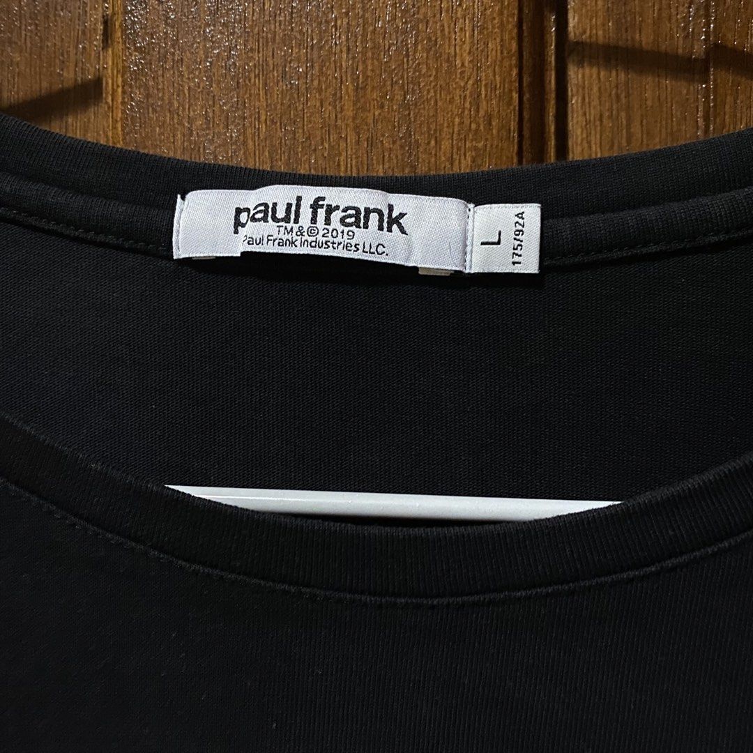 Paul Frank Black T-shirt (Category: Shirts) located in Cavite. Submitted by branchee_chic (Listing ID 1435794467, Image 3). Description: - Paul Frank black t-shirt - Size: Large - Features the iconic monkey graphic - Design includes monkey with eye patch - Crew neck and short sleeves - From 2019.
